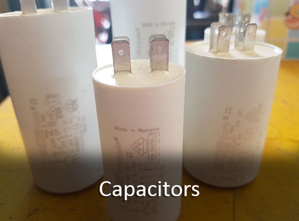 Motor start and motor run capacitors